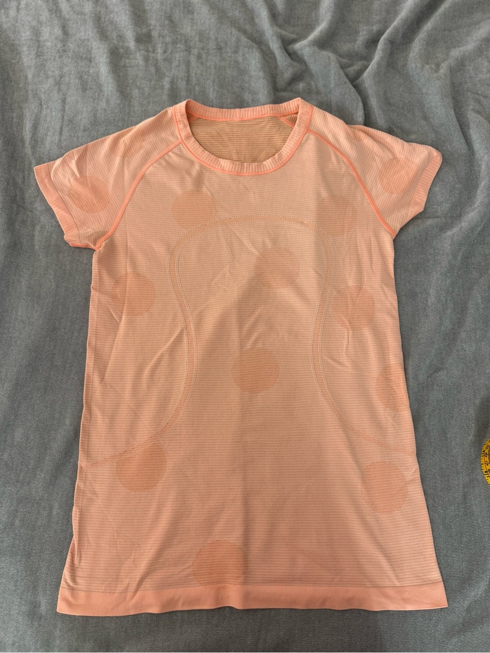 Lululemon Swiftly Tech short sleeve top in peach with subtle polka dot pattern